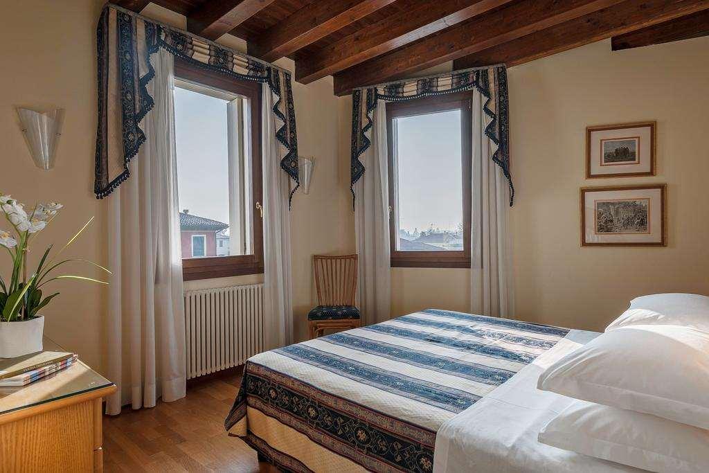 Palazzo Brando - Living Apartments Treviso Zimmer foto